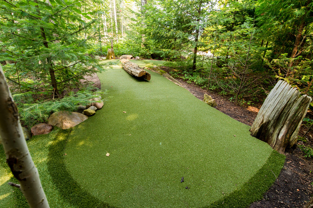 custom putting green in Petoskey home