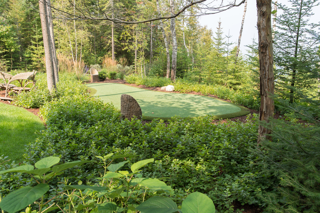 custom outdoor putting green in Northern Michigan home