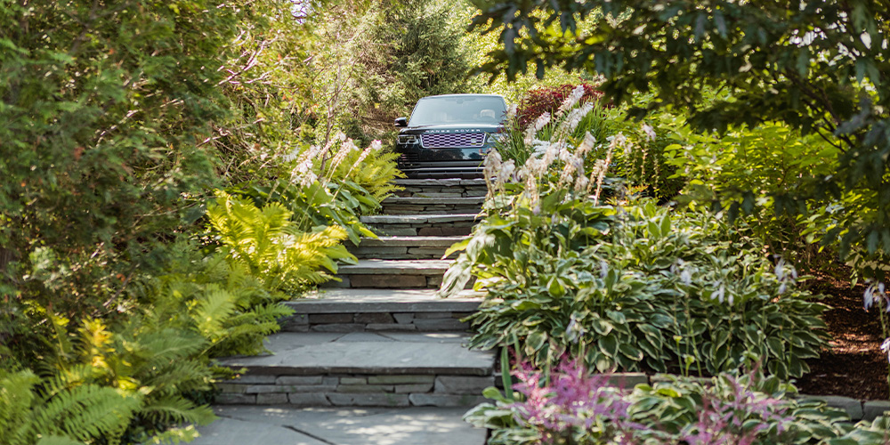 SUV looking over custom stone walkway and stairs